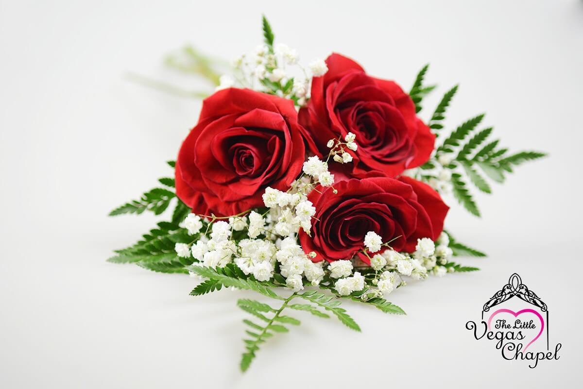 Three Stem Hand Tied Bouquet With Red Roses