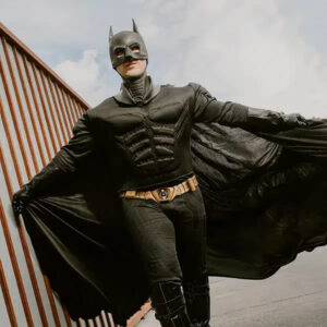An image of a person wearing batman costume featuring Batman-themed wedding
