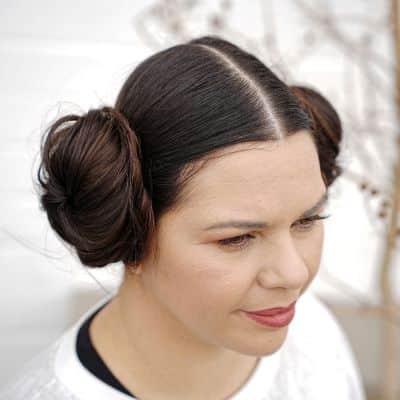 Hair Styled into Two Large Hair Buns on Either Side of the Head