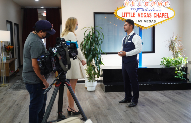 A couple in front of camera in a live streaming ceremony