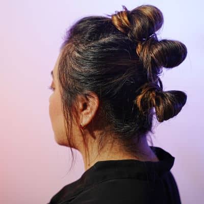 Hair Separated and Tied Into Three Loose Buns