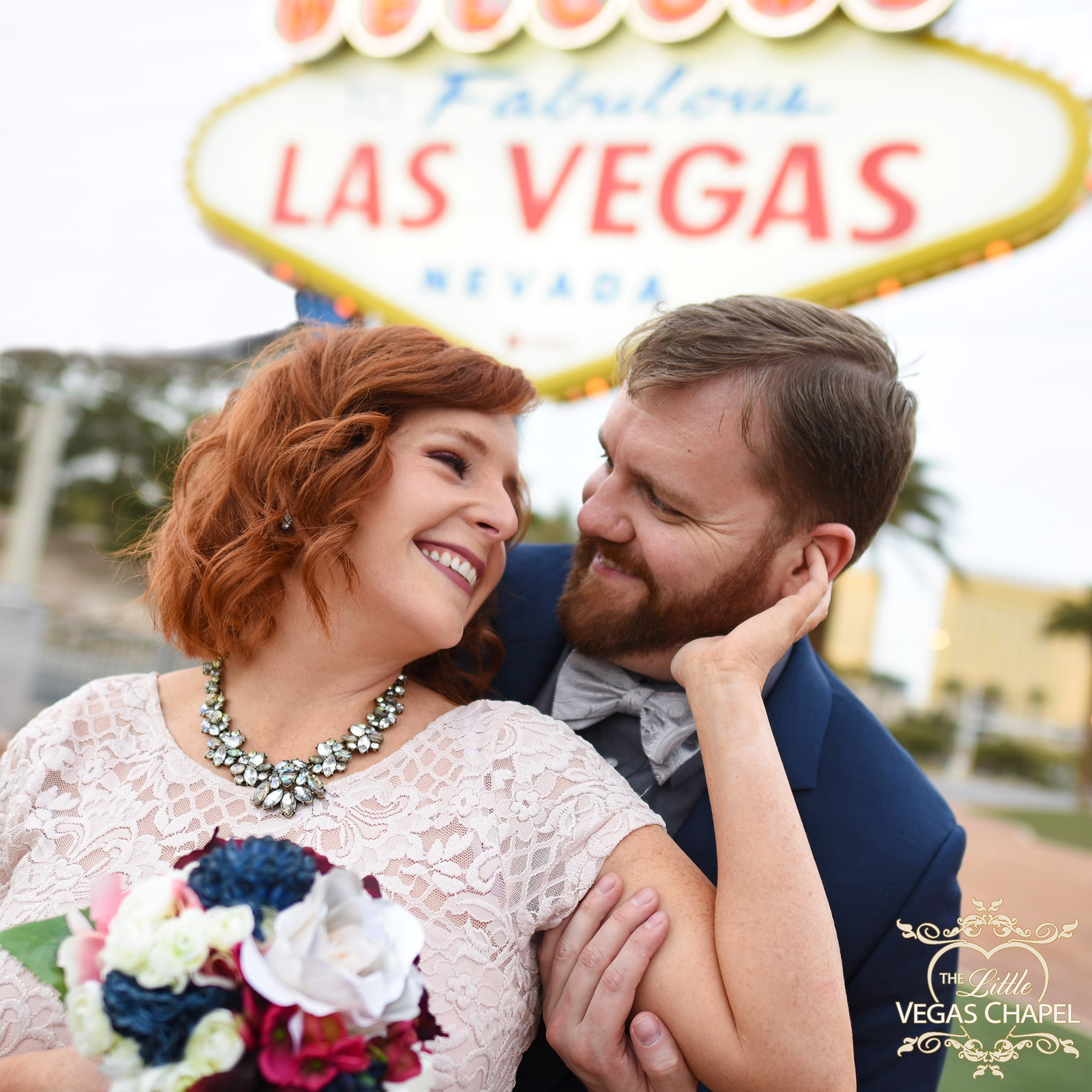 Wedding Photos in Front of Las Vegas Sign